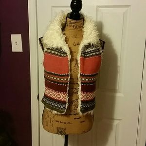 Very cute knitted vest with fuzzy faux fur lining!